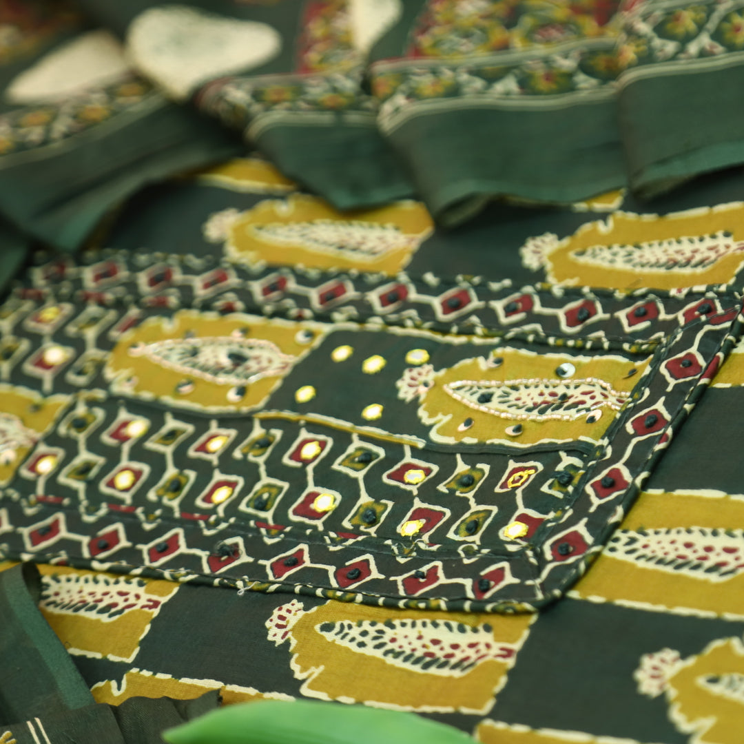 Payal Pine Green Patra with Mirror Work on Yoke in Ajrak Printed Cotton Suit Set
