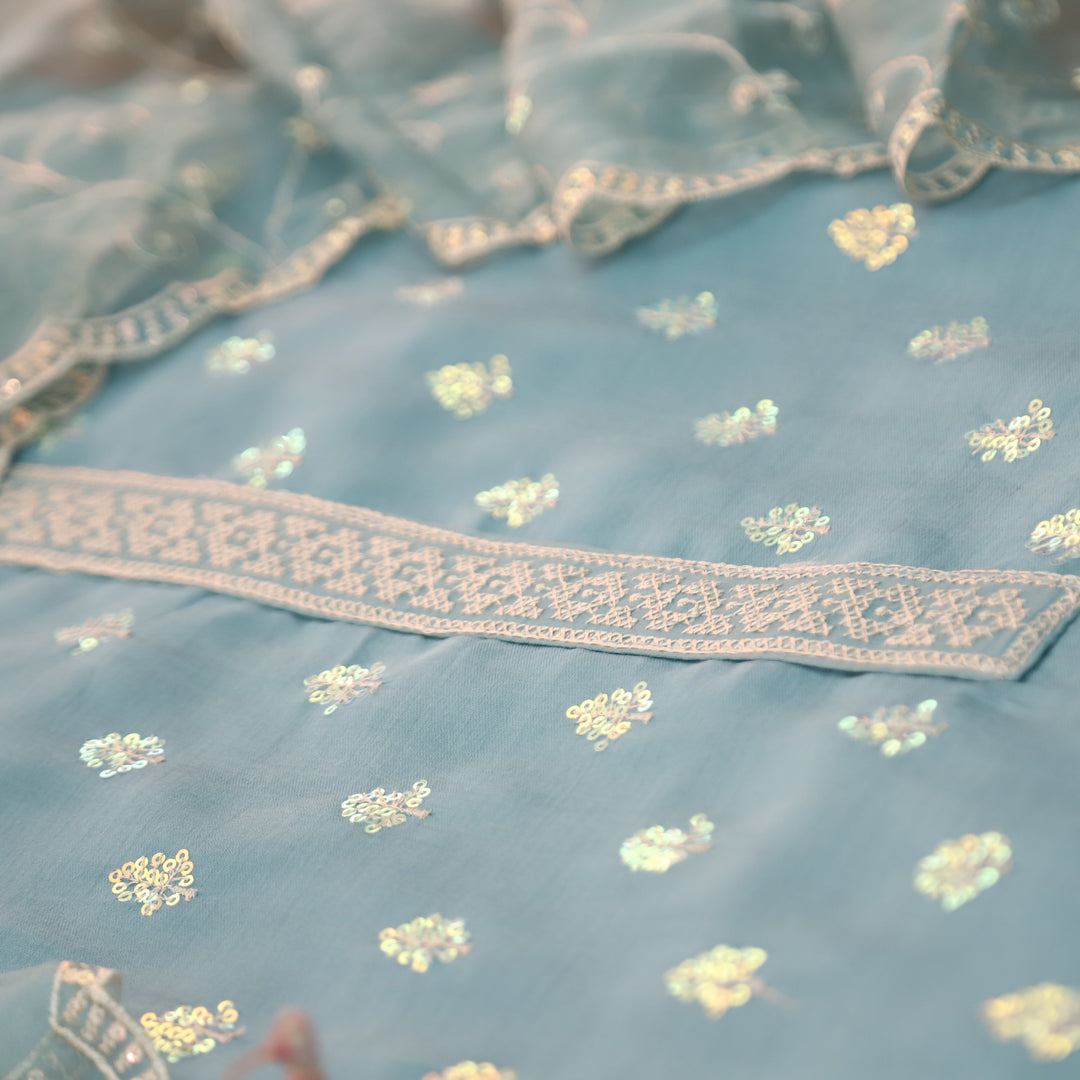 Sukhani Powder Blue All Over Sequence with Cut Work Hem Modal Suit Set