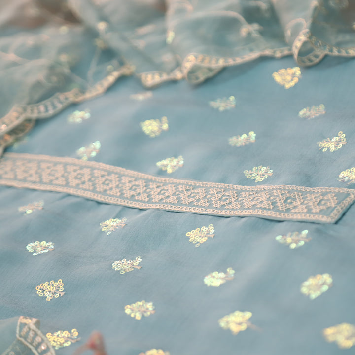 Sukhani Powder Blue All Over Sequence with Cut Work Hem Modal Suit Set