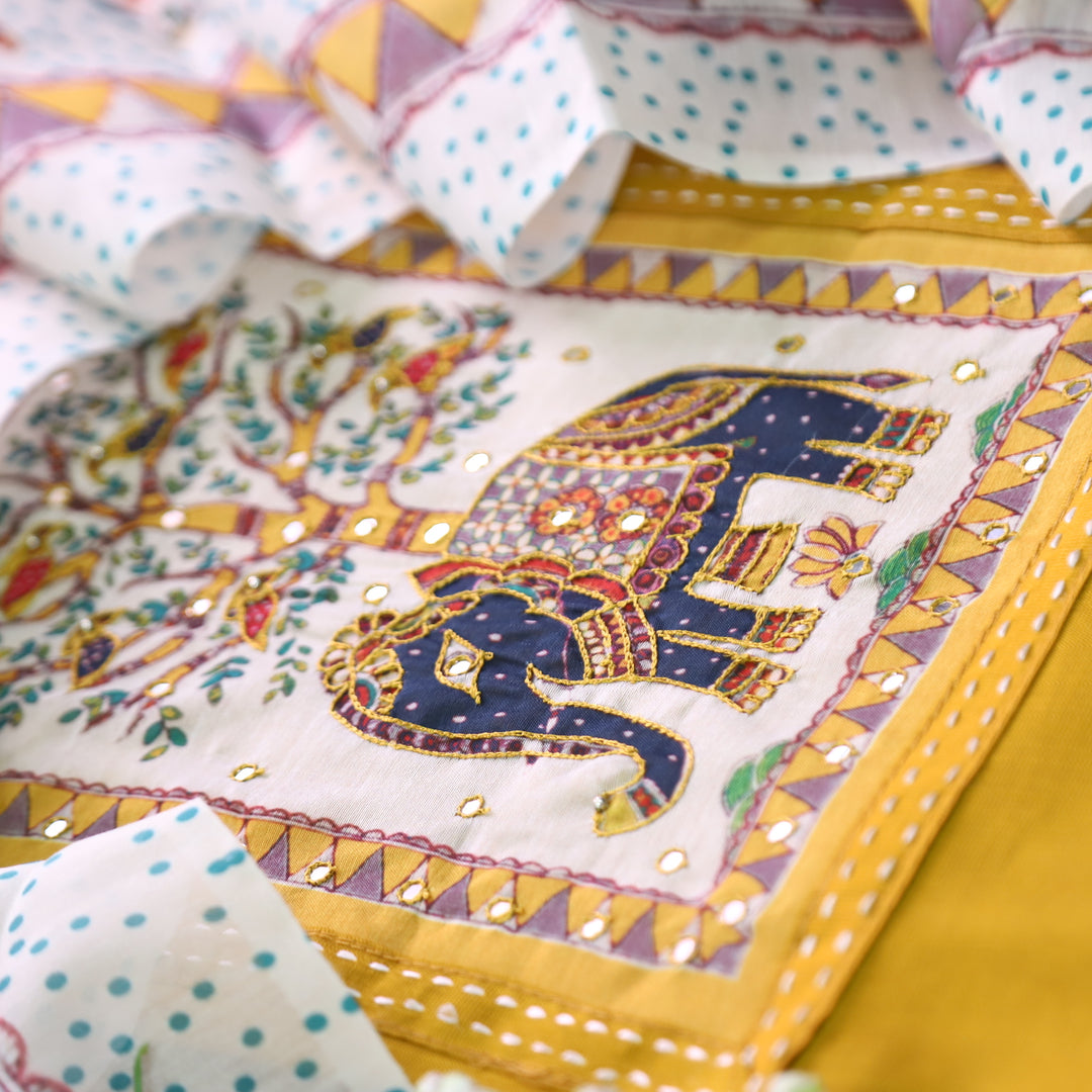 Samara Turmeric Yellow with Gajj Madhubani Print and Patra Yoke Modal Suit Set