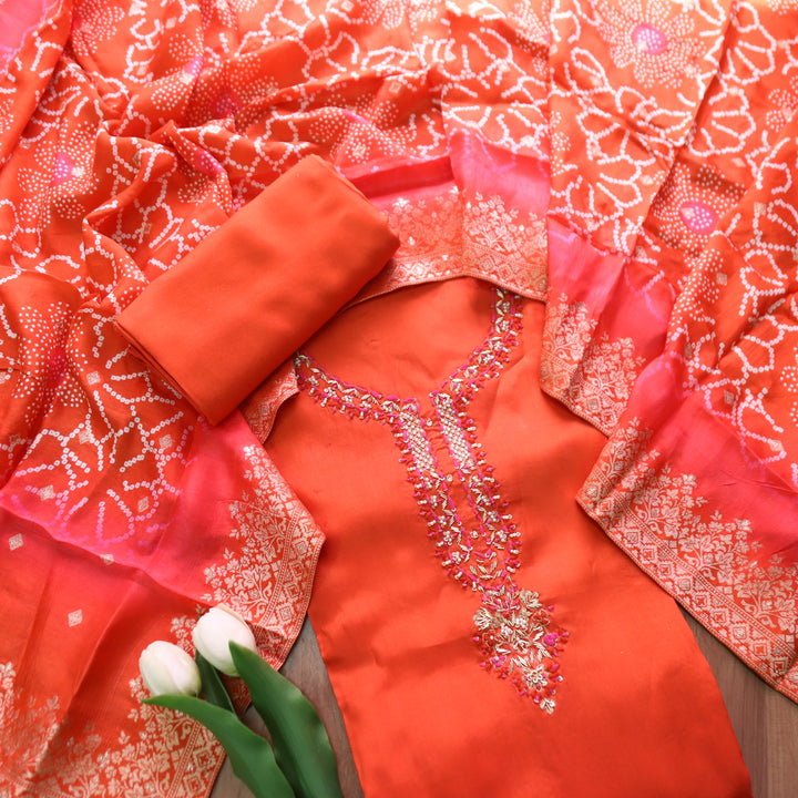 Shreya Tangerine Orange Embellished Kardana Work Neck in Dola Silk Set