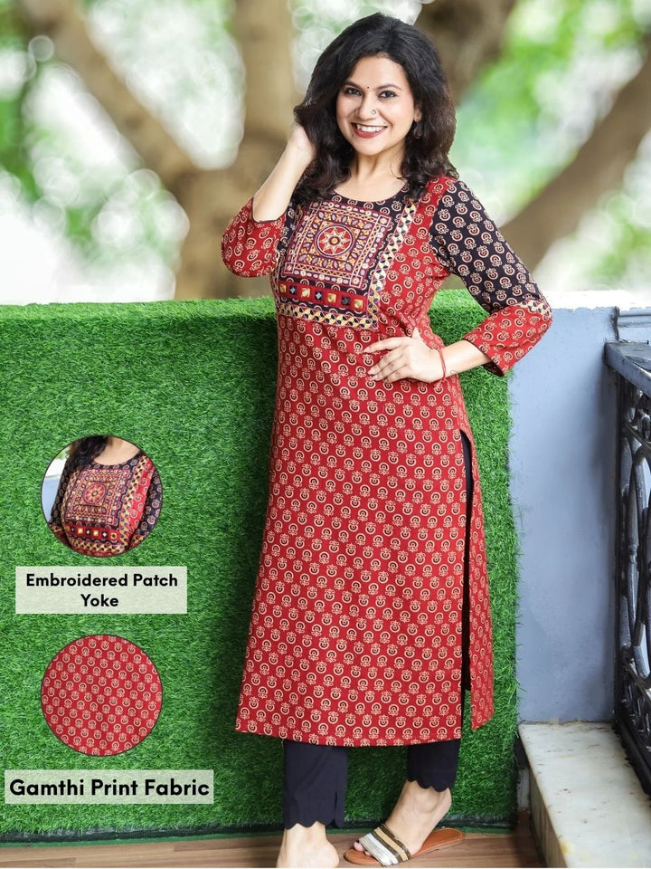 Gauri Maroon Red with Embroidered Patch Yoke in Gamthi Print Cotton Kurti