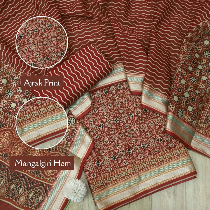 दिपशा Cheery Red Ajrak Printed Mangalgiri Hem Work Cotton Suit Set
