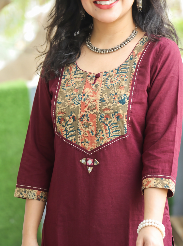 Kanak Wine Purple Kalamkari Printed Yoke Cotton Kurti