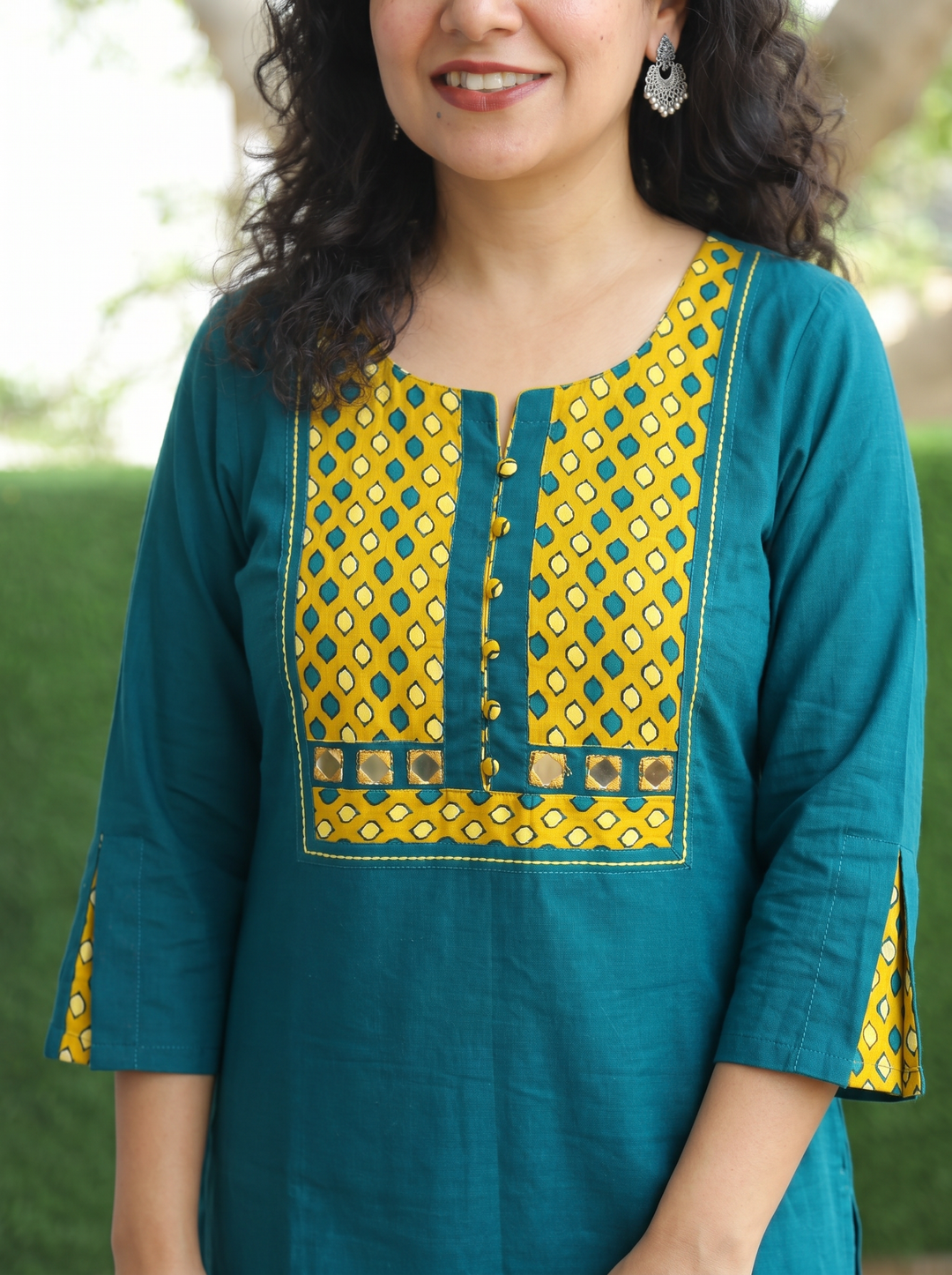 Sridevi Teal Potli with Mirror Ajrak Yoke Cotton Kurti