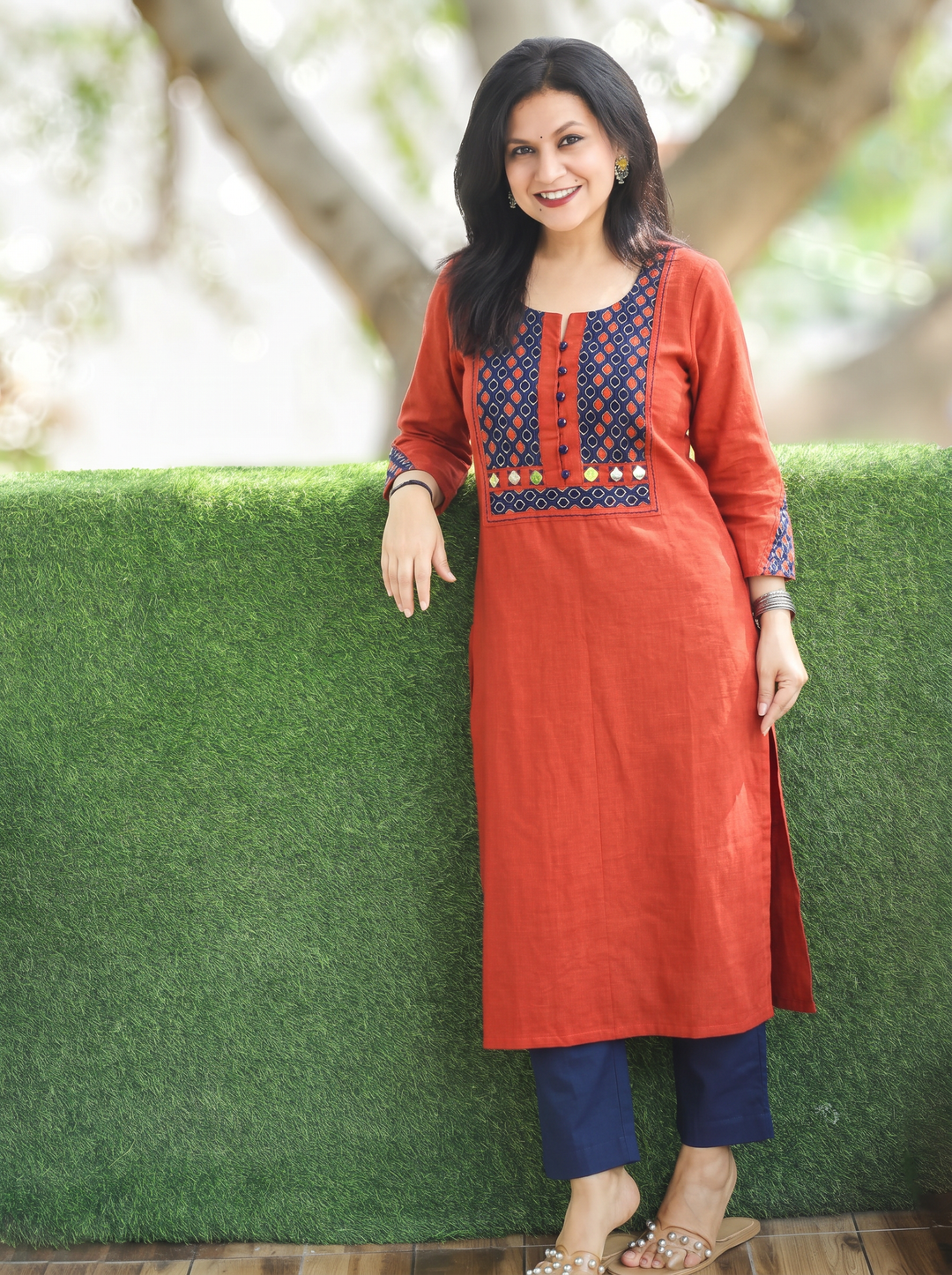 Sridevi Rust Orange Potli with Mirror Ajrak Yoke Cotton Kurti