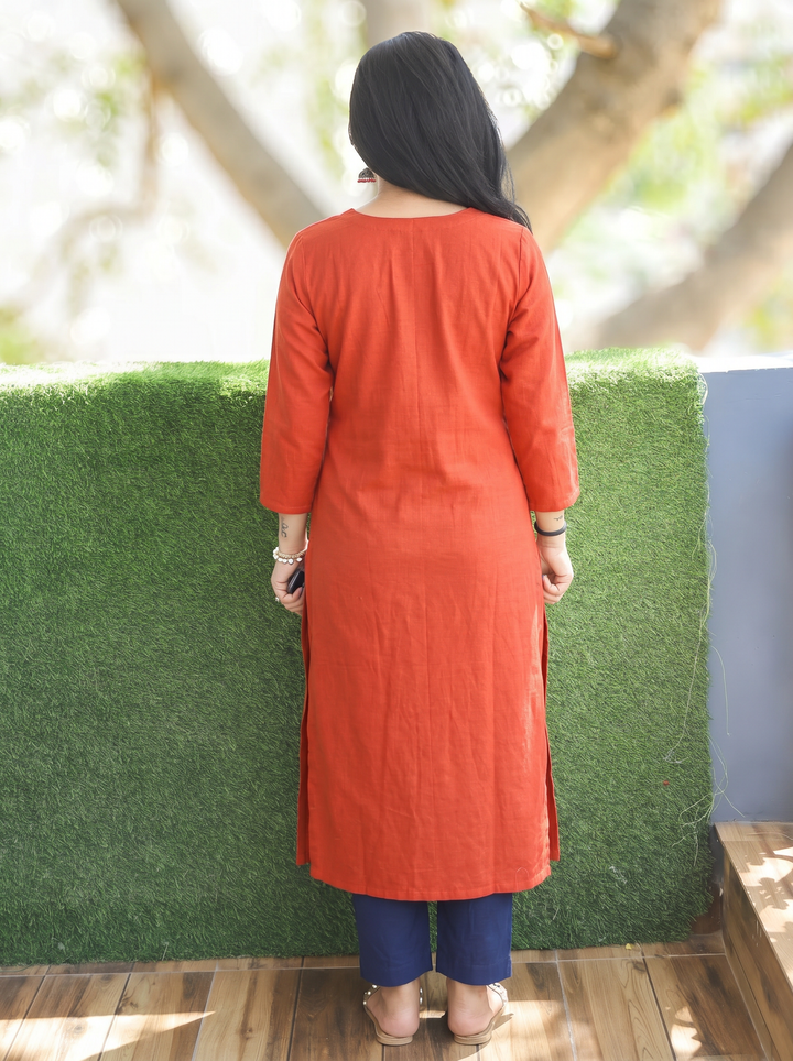 Sridevi Rust Orange Potli with Mirror Ajrak Yoke Cotton Kurti
