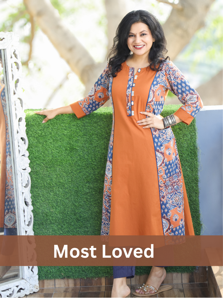 Khushi Rust Orange Mirror Work Round Neck Running Stitch Ajrak Print Panel Cotton Kurti