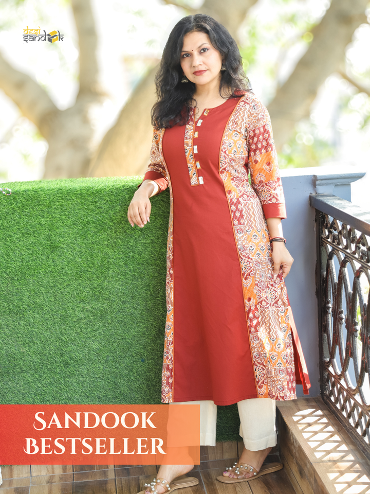 Khushi Burnt Rust Mirror Work Round Neck Running Stitch Ajrak Print Panel Cotton Kurti