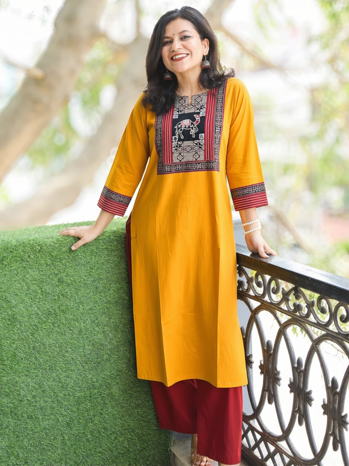 Megha Yellow Mirror Work Camel Yoke Cotton Kurti