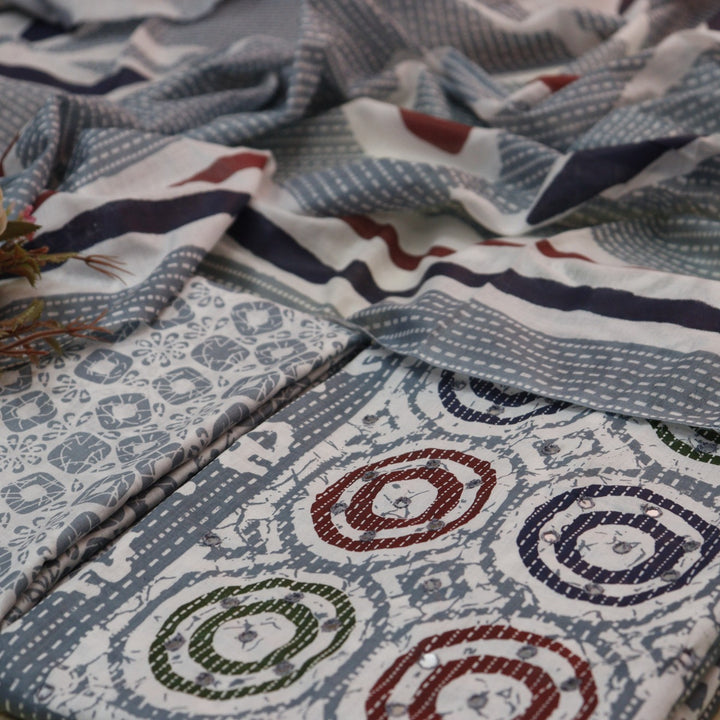 Chaahak Fossil Grey Patra Detailing in Batik Floral Printed Cotton Suit Set