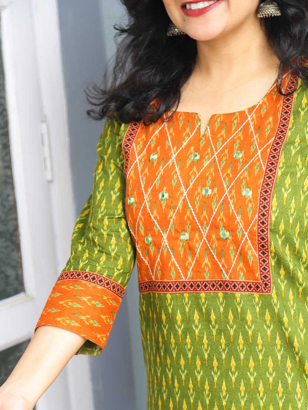 Kesariya Green with Orange Yoke with Mirror Work Ikkat Printed Cotton Kurti