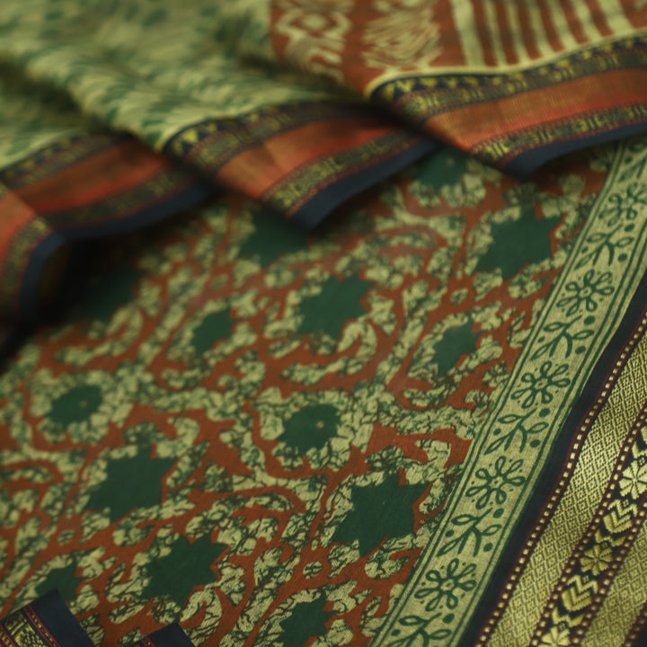 जीनत Pine Green Floral Printed Mangalgiri Hem Work Cotton Suit Set