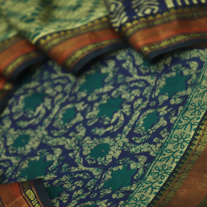 जीनत Deep Blue Floral Printed Mangalgiri Hem Work Cotton Suit Set