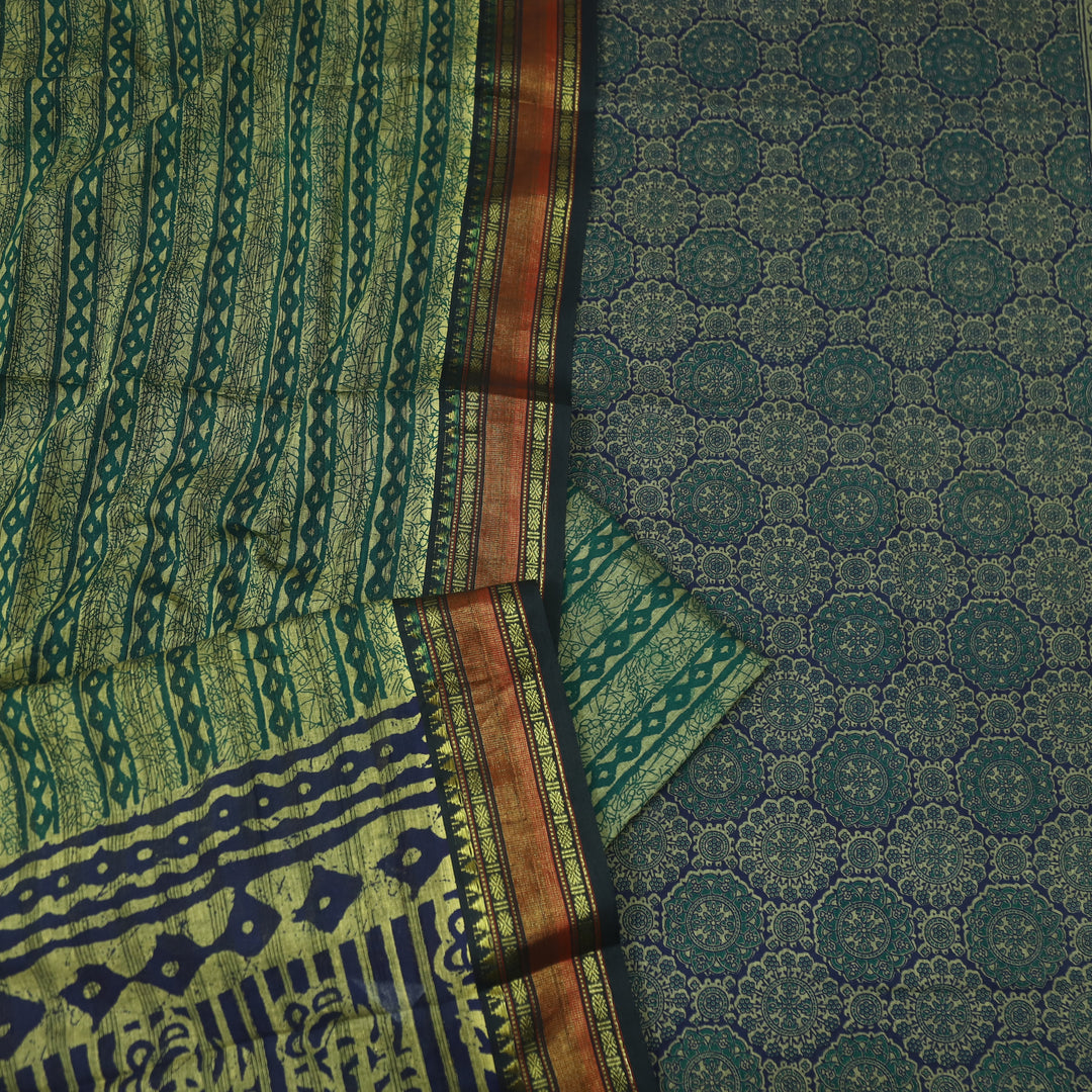 हीरल Dark Blue Ajrak Printed Mangalgiri Hem Work Cotton Suit Set