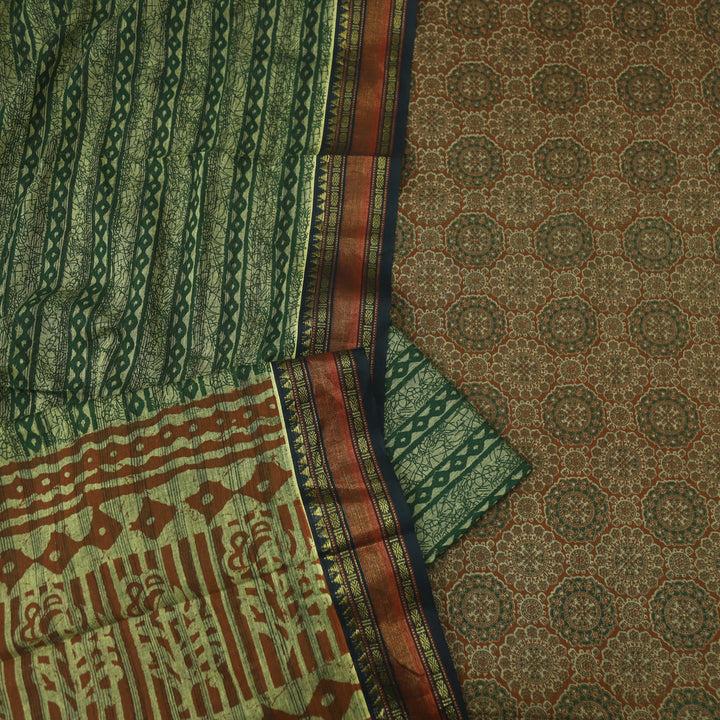 हीरल Rust Orange Ajrak Printed Mangalgiri Hem Work Cotton Suit Set