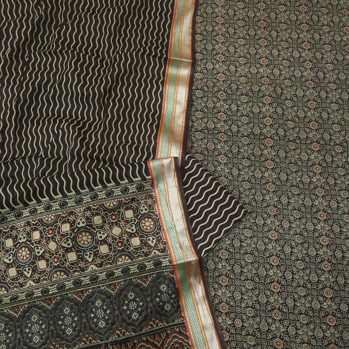 दिपशा Choco Brown Ajrak Printed Mangalgiri Hem Work Cotton Suit Set