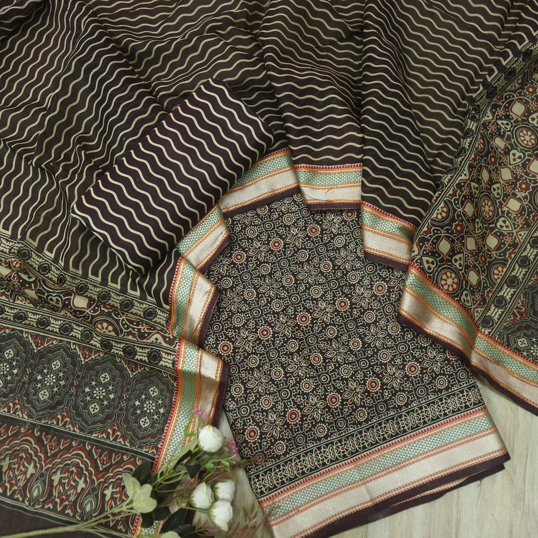 दिपशा Choco Brown Ajrak Printed Mangalgiri Hem Work Cotton Suit Set