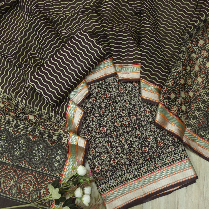 दिपशा Choco Brown Ajrak Printed Mangalgiri Hem Work Cotton Suit Set