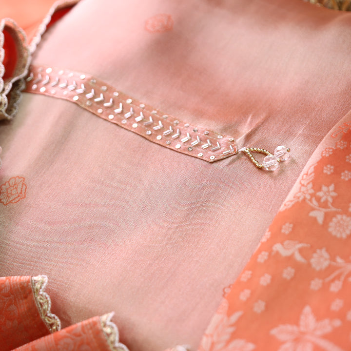 Naari Tang Orange Kardana Work with Zari Weaved Ziraf Suit Set