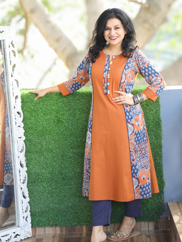 Khushi Rust Orange Mirror Work Round Neck Running Stitch Ajrak Print Panel Cotton Kurti
