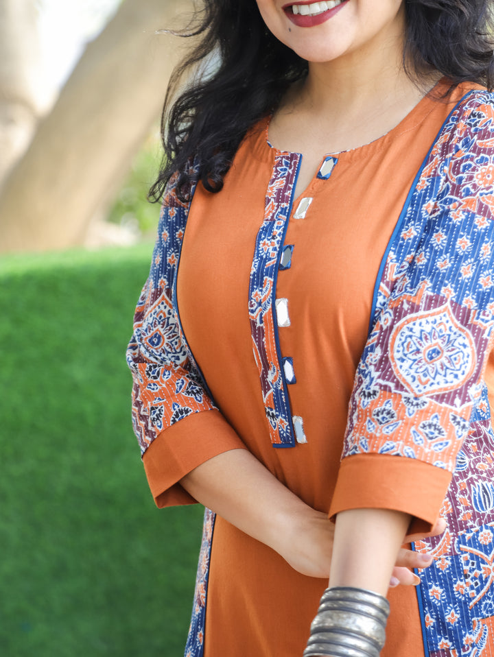 Khushi Rust Orange Mirror Work Round Neck Running Stitch Ajrak Print Panel Cotton Kurti