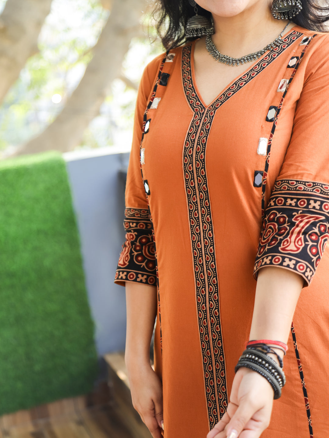 Aproova Rust Orange V Neck Patch in Panel Style with Mirror Work Cotton Kurti