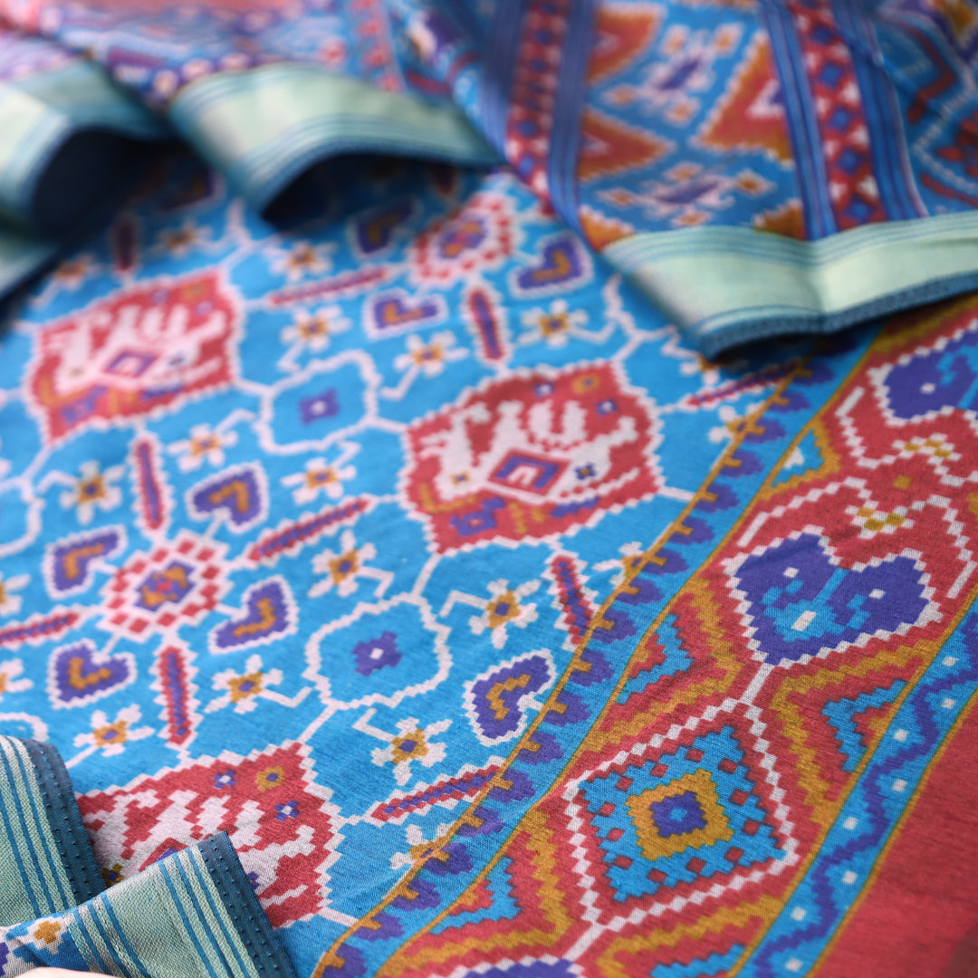 Pravi Sky Blue All Over Patola Shadow Printed Work Muslin Silk Set