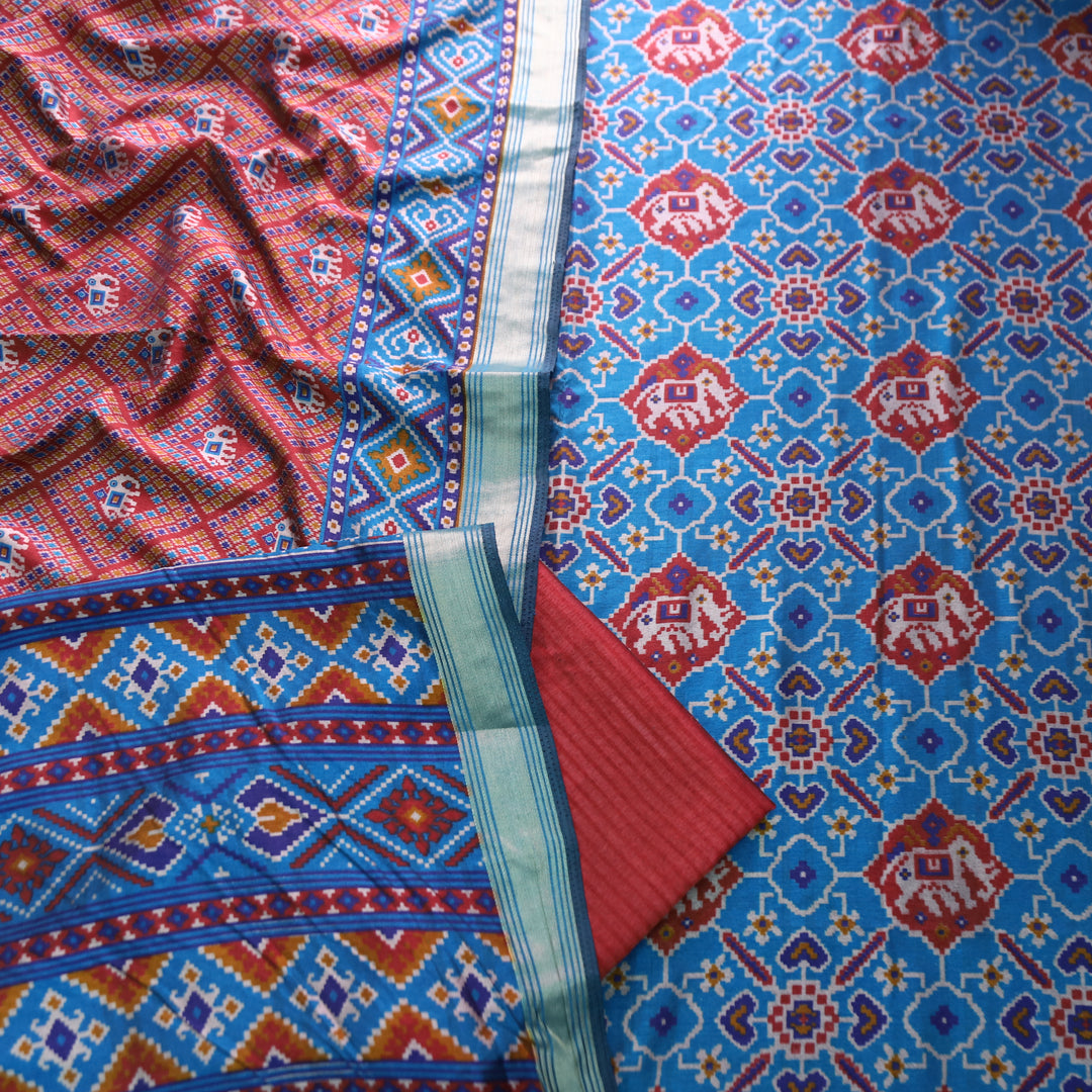Pravi Sky Blue All Over Patola Shadow Printed Work Muslin Silk Set