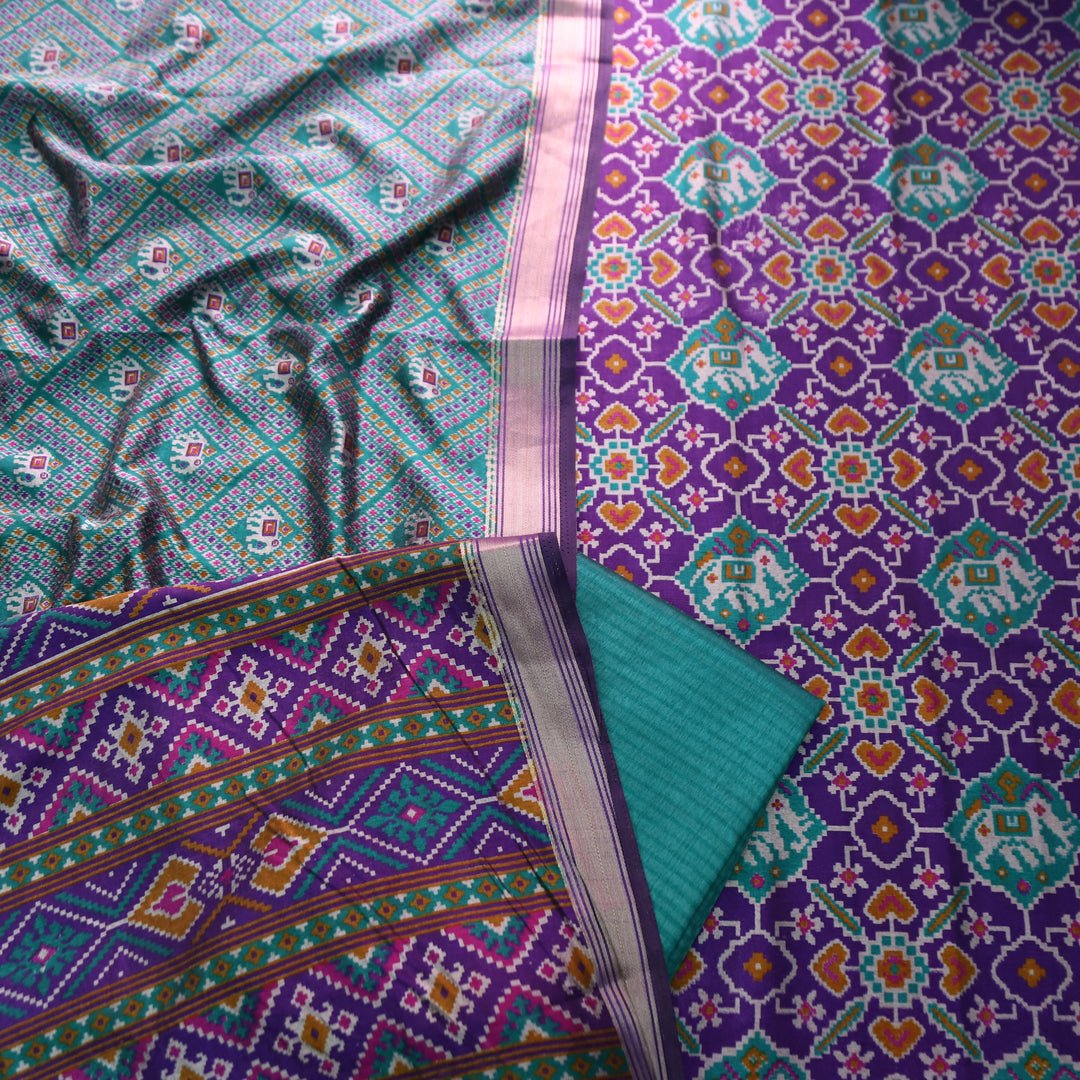 Pravi Blue All Over Patola Shadow Printed Work Muslin Silk Set