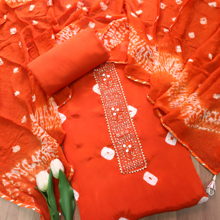 Vasudara Orange Embellished Work Bandhej and Shibori Hem Crepe Set