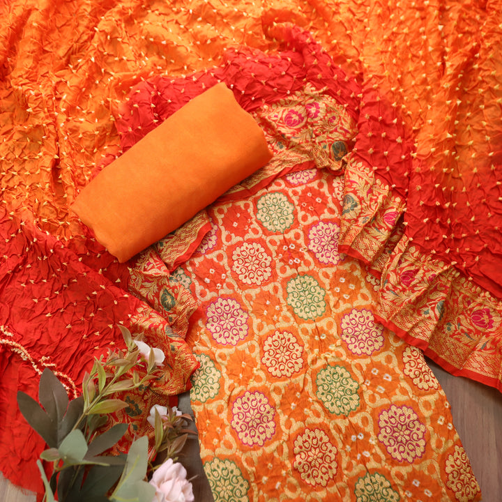 Nirvi Fire Orange All Over Bandhej Work Crepe Silk Set