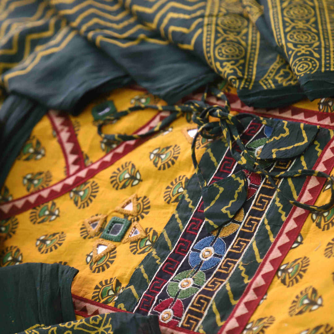 Sukhmani Canary Yellow Mirror Work Ajrak Printed Angrakha Cotton Suit Set