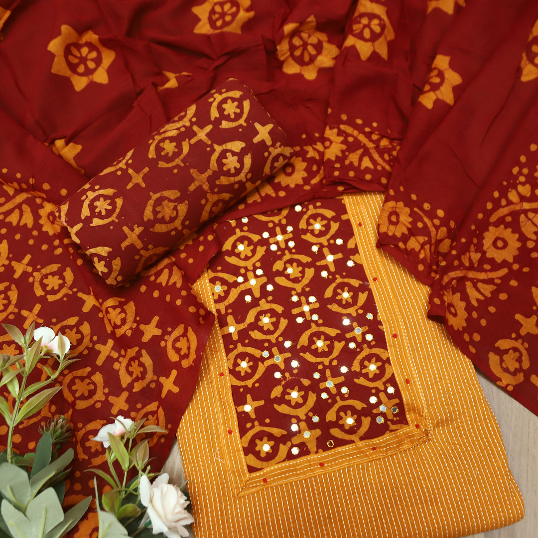 Sambhavi Tang Orange Batik Print with Patra Work Running Stitch Cotton Set