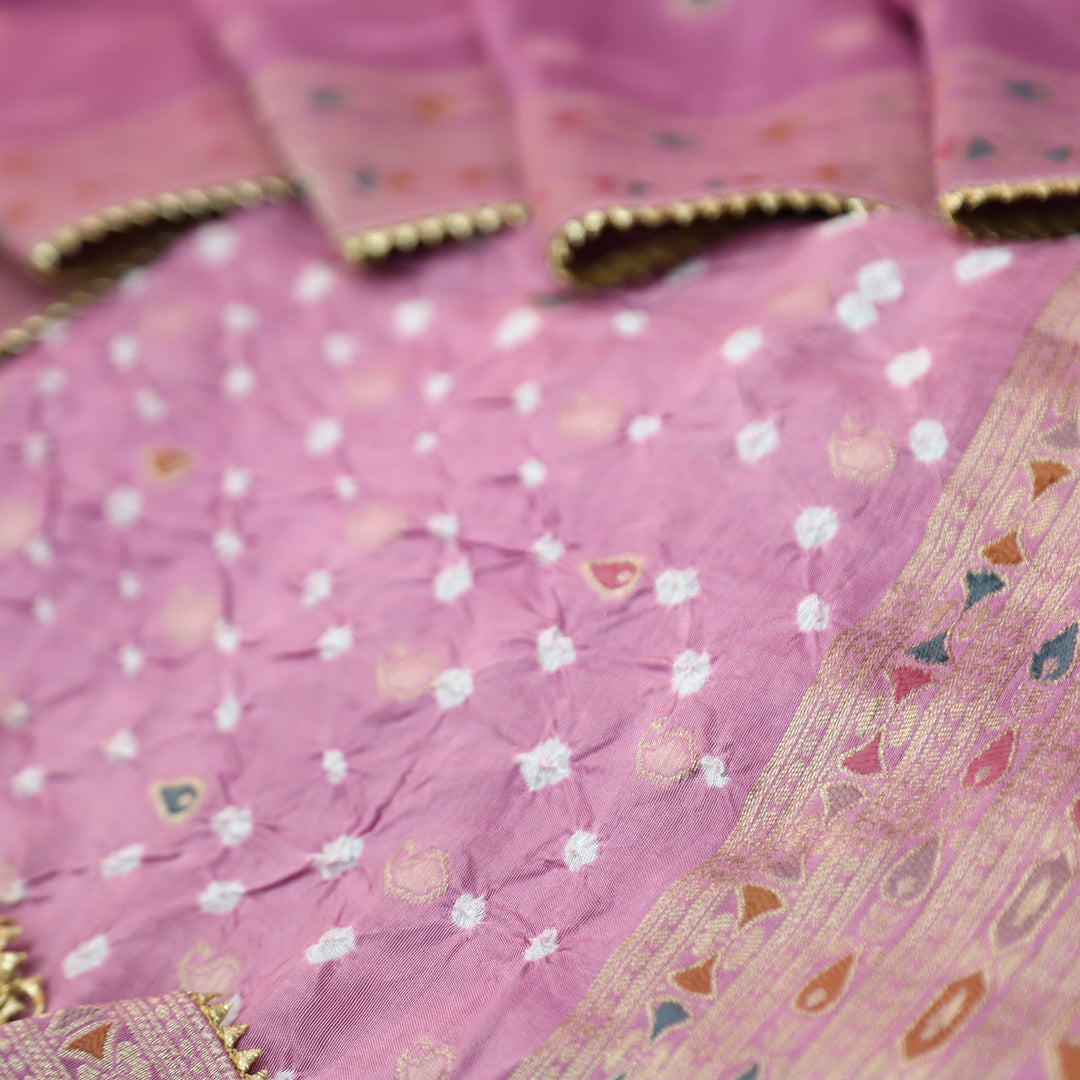 Naari Pastel Pink All Over Zari Weaved and Bandhej Work Crepe Silk Suit