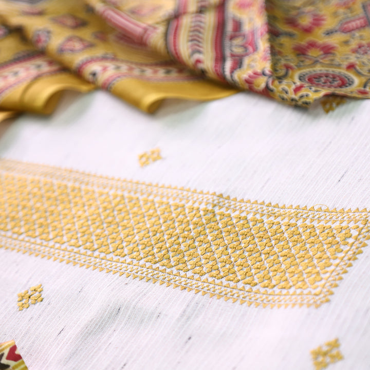 Aathiya Shell White with Yellow Thread Embroidered and Buti Work Cotton Suit Set
