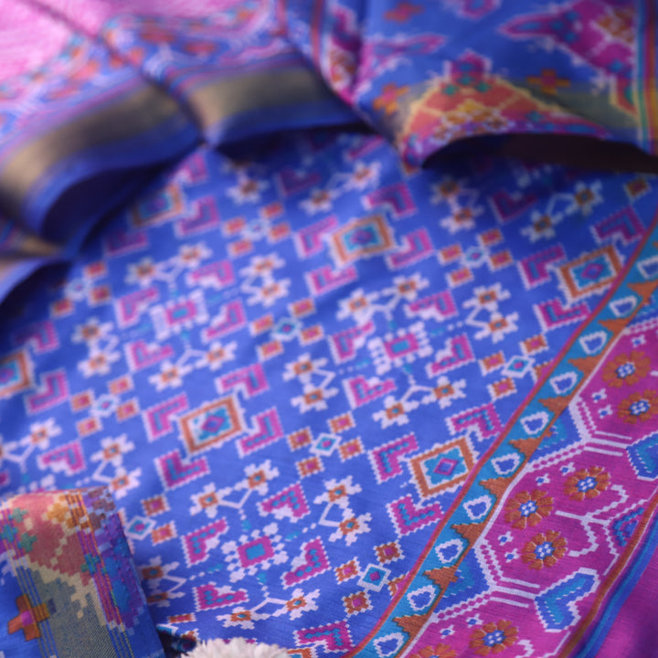 Sohini Electric Blue All Over Patola Shadow Printed Work Muslin Silk Suit Set