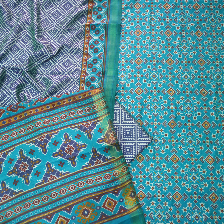 Sohini Aqua Teal All Over Patola Shadow Printed Work Muslin Silk Suit Set