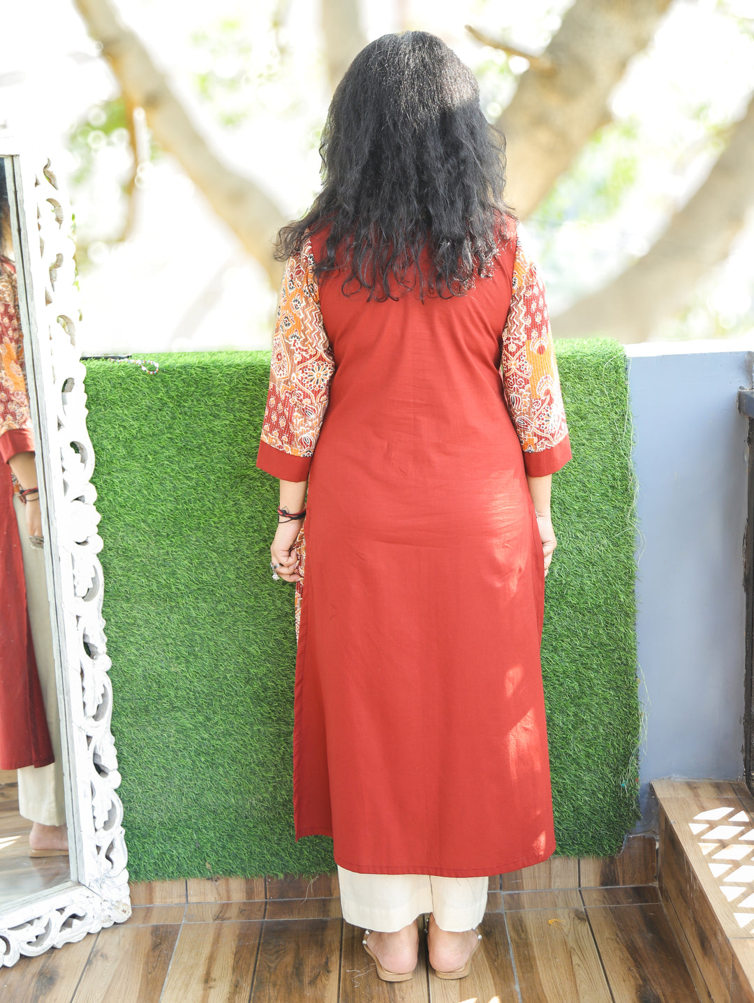 Khushi Burnt Rust Mirror Work Round Neck Running Stitch Ajrak Print Panel Cotton Kurti