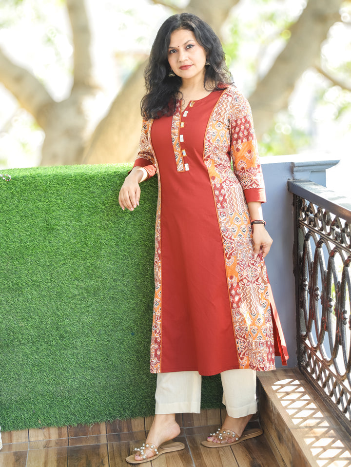 Khushi Burnt Rust Mirror Work Round Neck Running Stitch Ajrak Print Panel Cotton Kurti