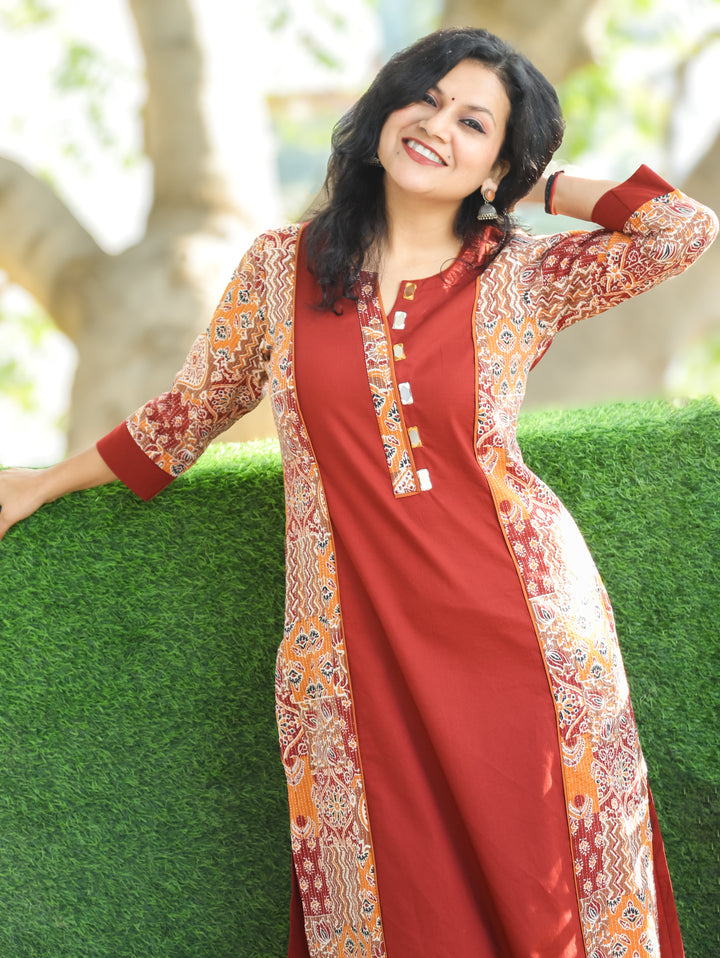 Khushi Burnt Rust Mirror Work Round Neck Running Stitch Ajrak Print Panel Cotton Kurti