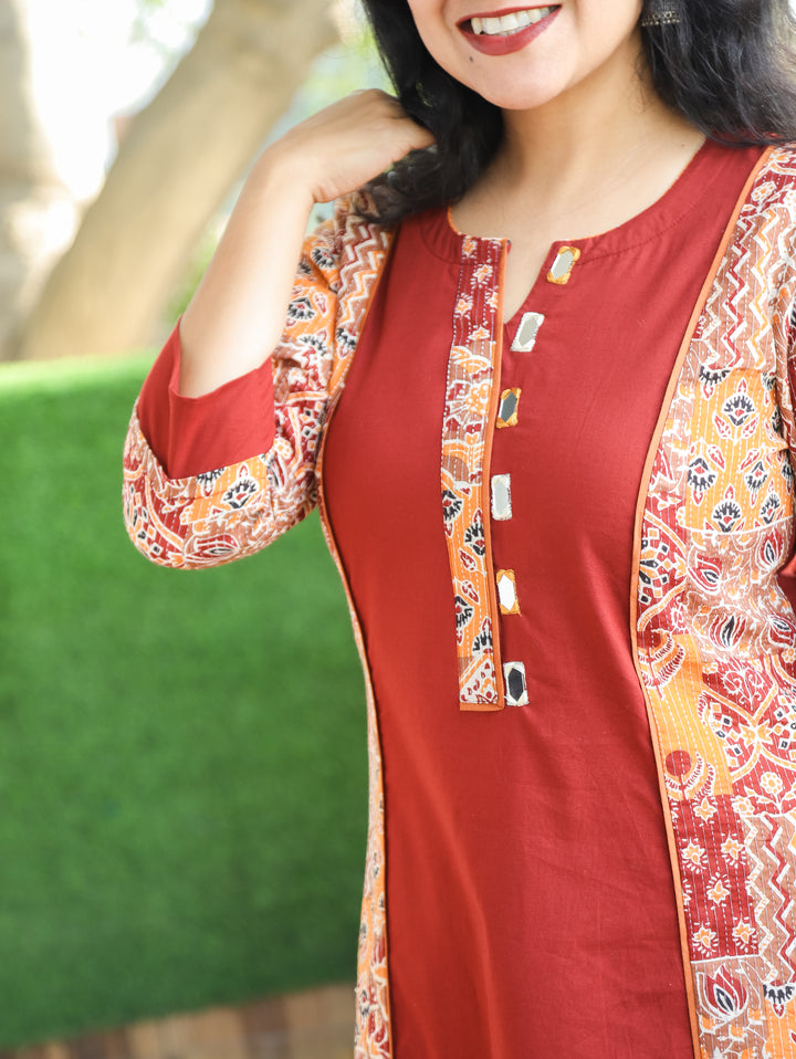 Khushi Burnt Rust Mirror Work Round Neck Running Stitch Ajrak Print Panel Cotton Kurti
