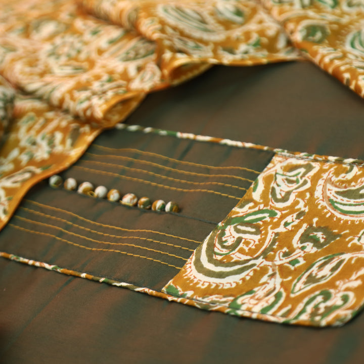 Radhika Mehndi Green Potli Button with Kalamakari Printed Neck Patch Cotton Suit Set