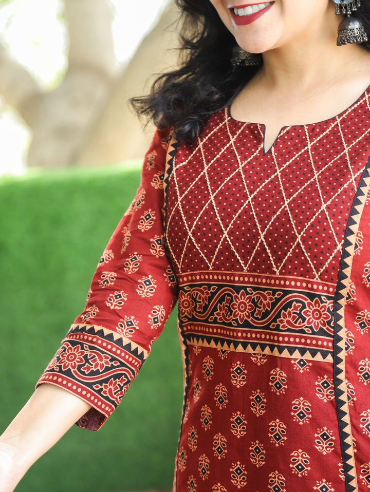Mehram Maroon Red Running Thread Yoke in Panel Style Ajrak Printed Cotton Kurti
