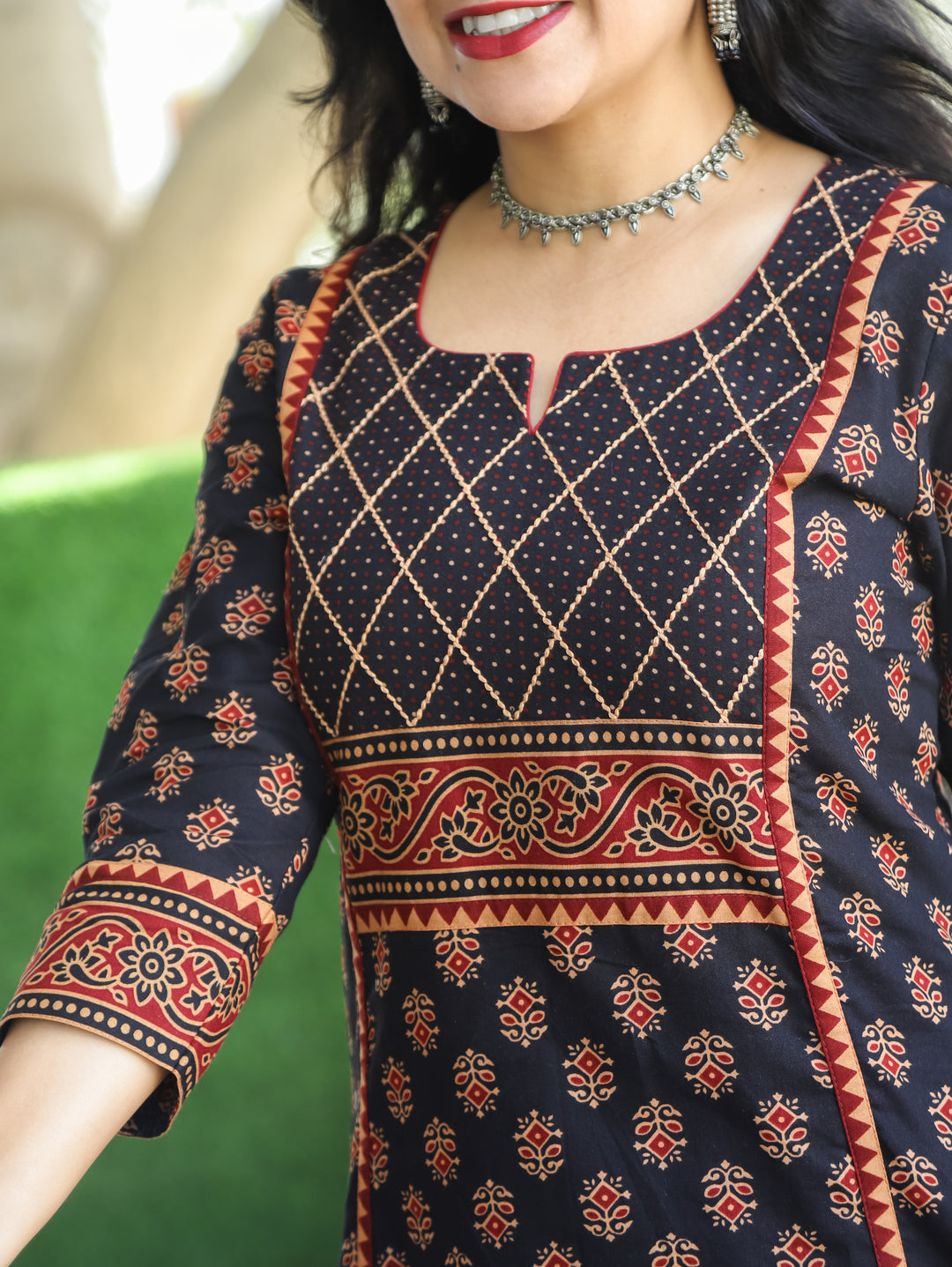 Mehram Ebony Black Running Thread Yoke in Panel Style Ajrak Printed Cotton Kurti