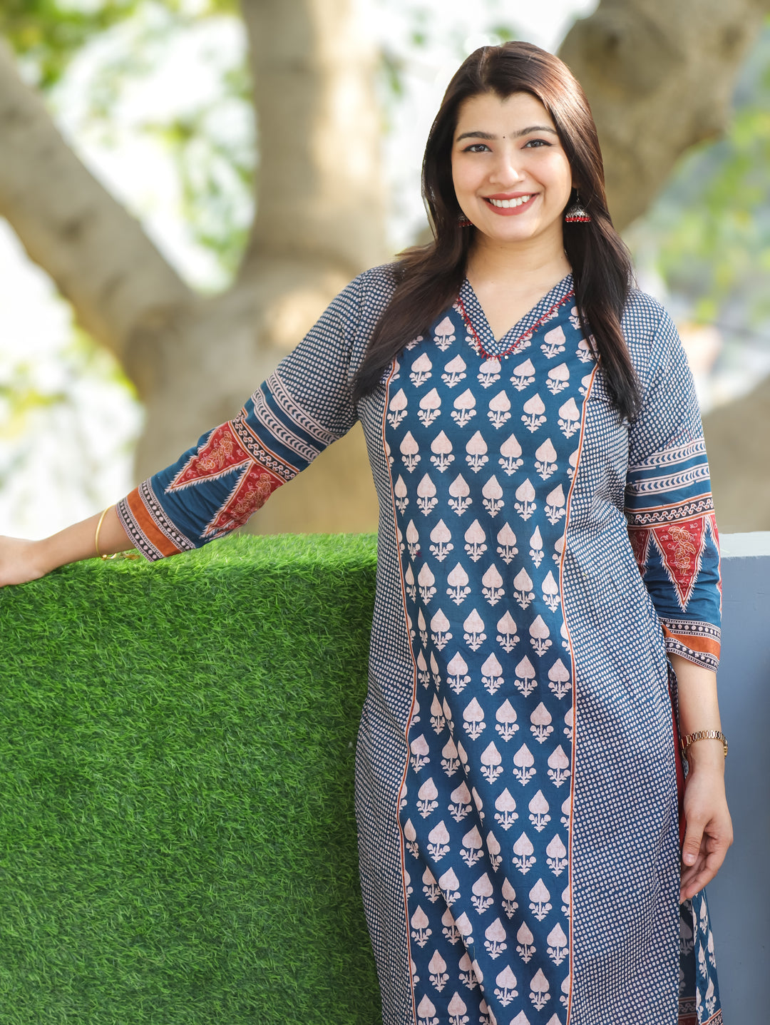 Madhu Navy Blue V Neck All Over Printed in Panel Style Cotton Kurti