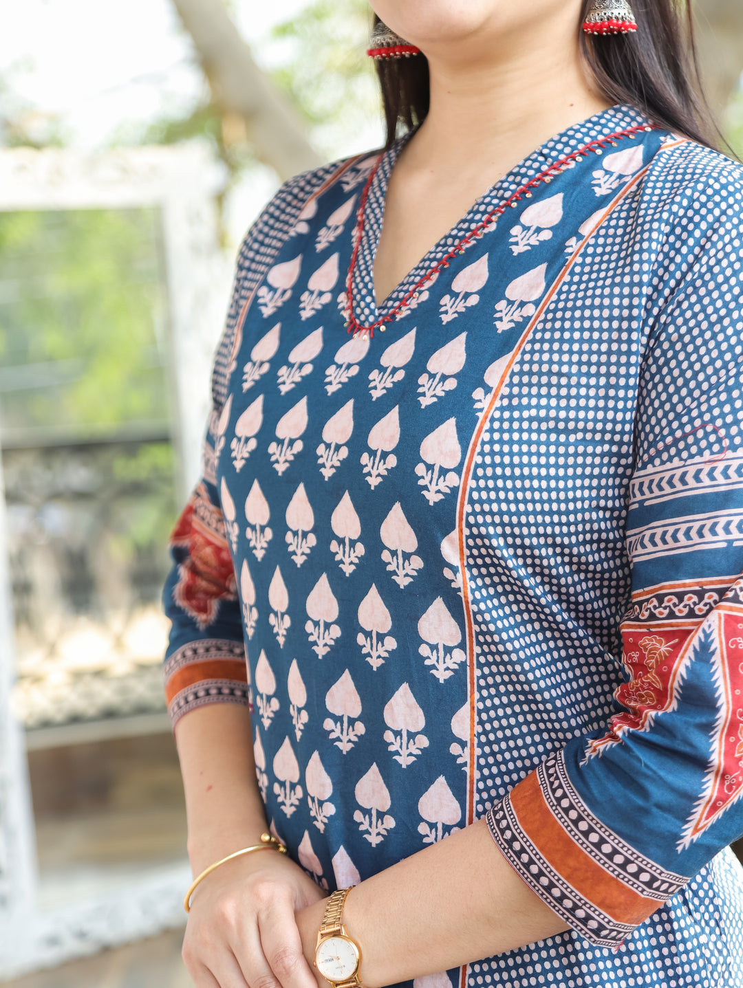 Madhu Navy Blue V Neck All Over Printed in Panel Style Cotton Kurti