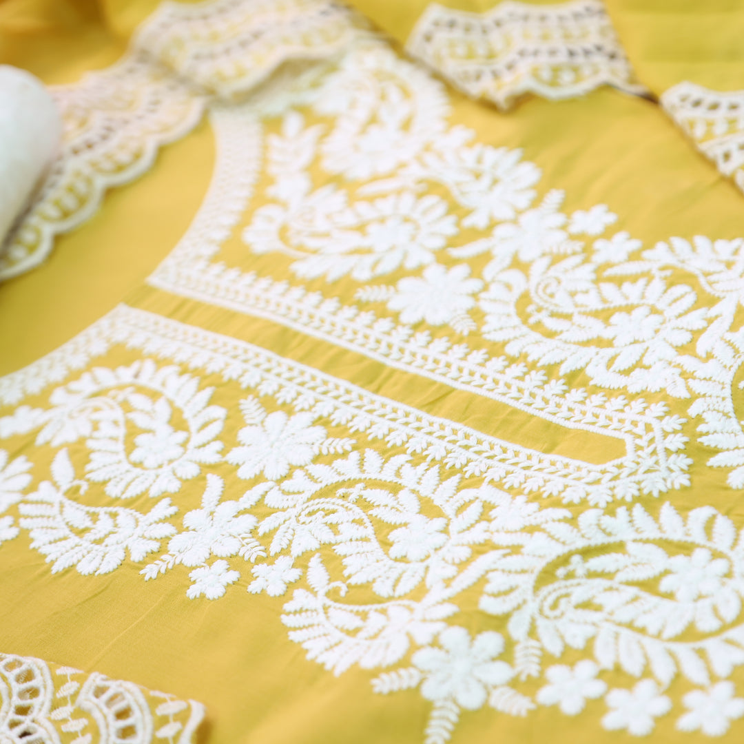 Apurva Custard Yellow Chikankari inspired Thread Neck Work Cotton Suit Set