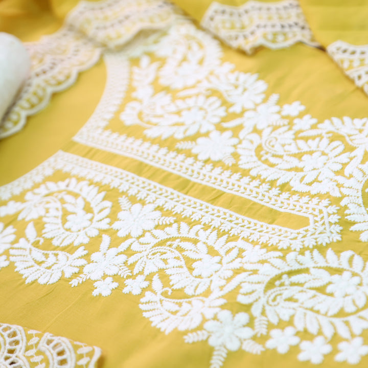 Apurva Custard Yellow Chikankari inspired Thread Neck Work Cotton Suit Set