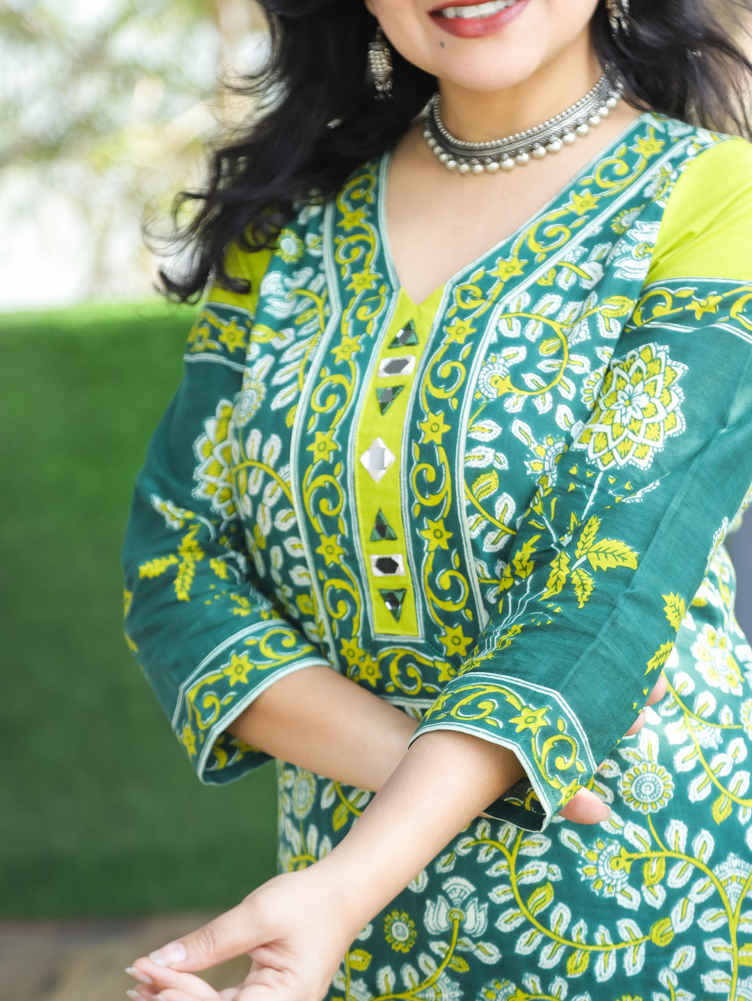 Palki Pine Green V Neck Mirror Work Kalamkari Floral Printed Cotton Kurti